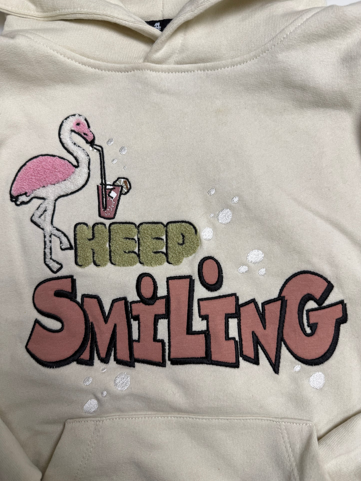Hoodie „Keep Smiling creme“ – Bio-Baumwolle trifft gute Laune