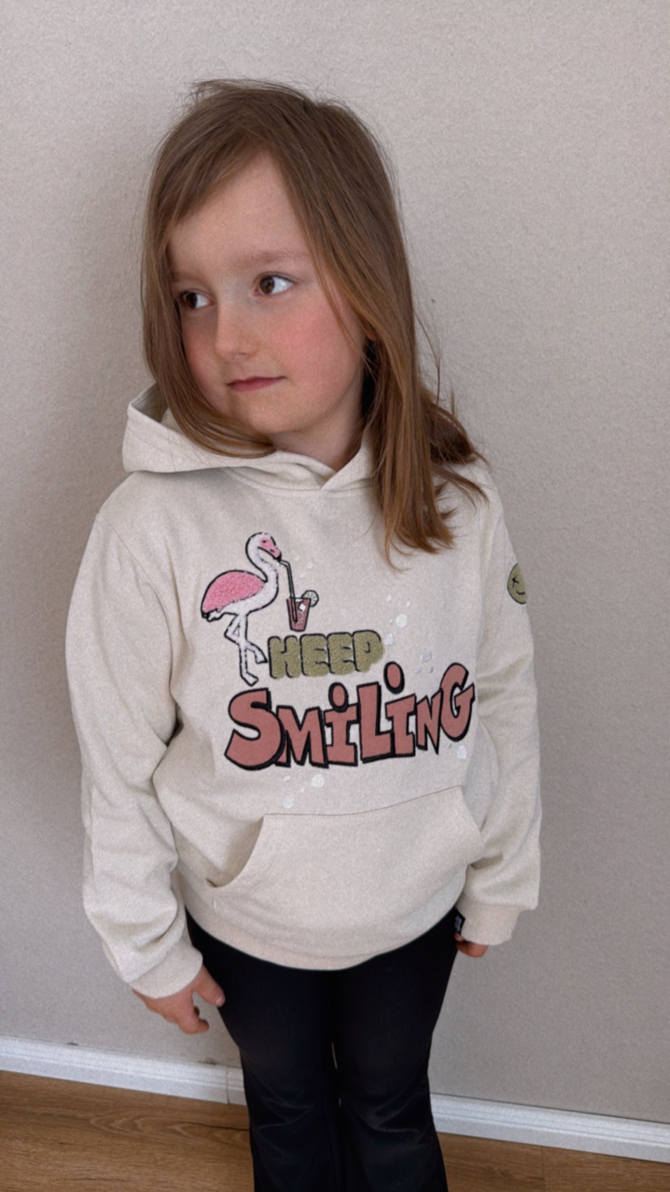 Hoodie „Keep Smiling creme“ – Bio-Baumwolle trifft gute Laune